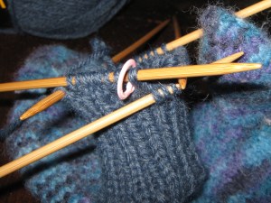 Mitten knitting another mitten
