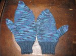 Mittens before and after felting