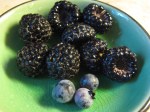 Fresh picked black raspberries and blue blueberries